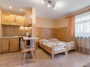 Posteľ alebo postele v izbe v ubytovaní Willa Bożena 2