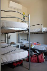 a couple of bunk beds in a room at Acqua Dolce in Rio Marina