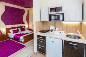 Kuchyňa alebo kuchynka v ubytovaní Almafa Apartmanház