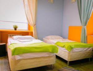 Cama o camas de una habitación en Fusion Hostel