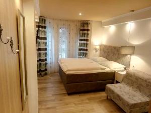 Łóżko lub łóżka w pokoju w obiekcie Pension Wachau