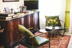 Telewizja i/lub zestaw kina domowego w obiekcie Hotel Eden