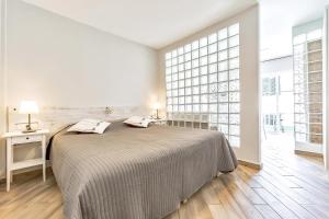 Ένα ή περισσότερα κρεβάτια σε δωμάτιο στο Casa Endorfina Rooms