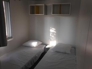Camping l'Eléphant客房内的一张或多张床位