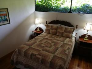 Ένα ή περισσότερα κρεβάτια σε δωμάτιο στο Casa Bali Verde