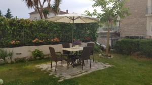 Vonkajšia záhrada v ubytovaní Studio Apartman San