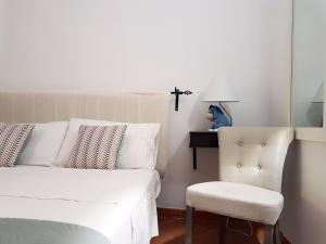 Posteľ alebo postele v izbe v ubytovaní Villa del Sogno