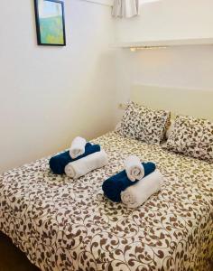 Säng eller sängar i ett rum på villa Castillo Alto