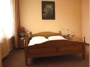 Кровать или кровати в номере Hotel Polonia