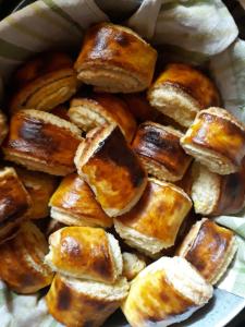 a pile of sticky pastries in a bowl at Hotel Tekla in Ushguli