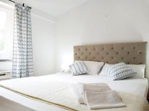 Posteľ alebo postele v izbe v ubytovaní Villa del Sogno