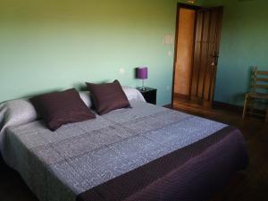 Postel nebo postele na pokoji v ubytování Casa Rural Alada