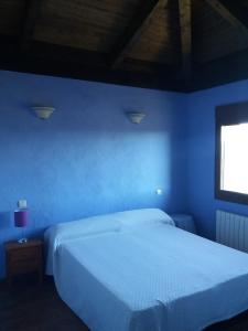 Postel nebo postele na pokoji v ubytování Casa Rural Alada