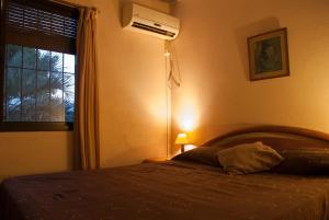 Cama o camas de una habitación en Casas de la Paloma - BUTIA