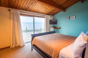 Säng eller sängar i ett rum på Ocean Resort