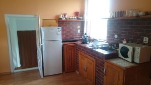 Cucina o angolo cottura di Pensiunea Ivanciu Bogdan