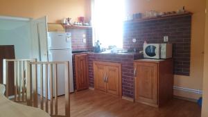Cucina o angolo cottura di Pensiunea Ivanciu Bogdan