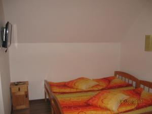 Letto o letti in una camera di Pensiunea Ivanciu Bogdan