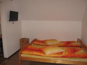 Letto o letti in una camera di Pensiunea Ivanciu Bogdan