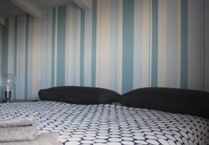 A bed or beds in a room at B&B Al Gravattone