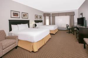 Ένα ή περισσότερα κρεβάτια σε δωμάτιο στο Baymont by Wyndham Roswell
