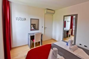 Postel nebo postele na pokoji v ubytování Apartmani Astrado Petrčane