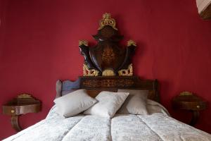 Säng eller sängar i ett rum på La Caseta del Priorat