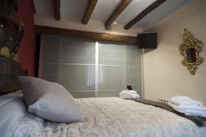 Posteľ alebo postele v izbe v ubytovaní La Caseta del Priorat