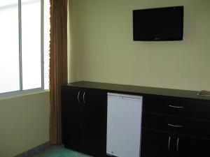 Kuchyň nebo kuchyňský kout v ubytování Hotel Chicama