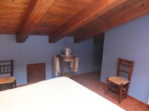 Postel nebo postele na pokoji v ubytování Casa Gómez