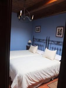 Postel nebo postele na pokoji v ubytování Casa Gómez