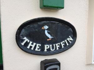 Sijil, anugerah, tanda atau dokumen lain yang dipamerkan di The Puffin Baltimore