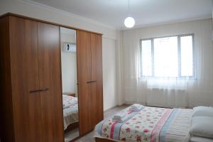 Sakura Apartments Trabzonにあるベッド