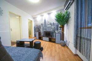 a living room with a view of a city at Apartment Marica Skadarlija in Belgrade