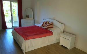 Una cama o camas en una habitación de Villa in Le Tamier, 4 bedrooms, 300m Flic en Flac beach