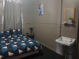 Postel nebo postele na pokoji v ubytování Hotel Kerwick