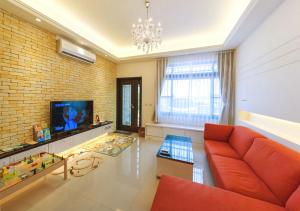 TV a/nebo společenská místnost v ubytování Manman B&B