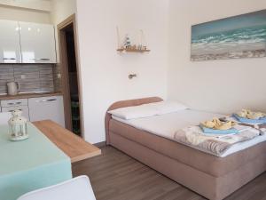 Postel nebo postele na pokoji v ubytování Apartments Hrgovcic