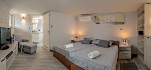 Cama o camas de una habitación en Villa Bandic