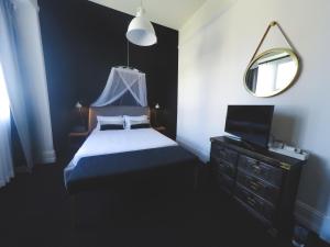 Postel nebo postele na pokoji v ubytování Hotel Palisade