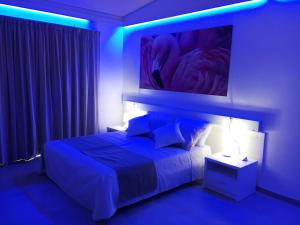 Кровать или кровати в номере 309 Le Saline - Stintino