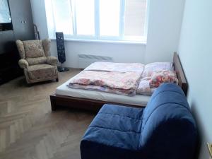 Postel nebo postele na pokoji v ubytování Apartman u Vila Tugenhart
