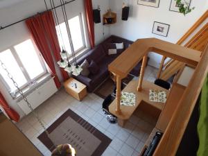 an overhead view of a living room with a couch at Fewo Oase 28_GROT in Ostseebad Karlshagen