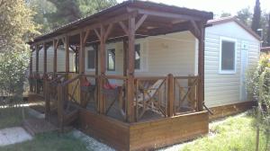 a screened in porch on a tiny house at Mobile Home Cinzia in Pula
