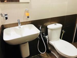 Koupelna v ubytování ABM Express Inn