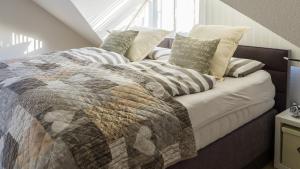 מיטה או מיטות בחדר ב-Spessart-Romantik