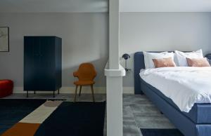 Postel nebo postele na pokoji v ubytování Hotel Pistache Den Haag