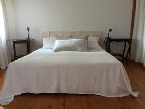 Postel nebo postele na pokoji v ubytování Casa Cecilia Country House
