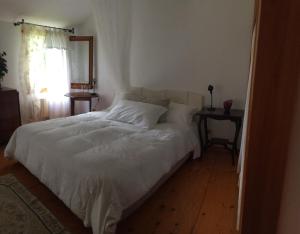 Postel nebo postele na pokoji v ubytování Casa Cecilia Country House