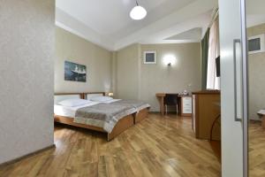 Letto o letti in una camera di Irmeni Hotel